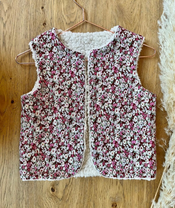 gilet sans manche imprimé fleuri rose 4 ans